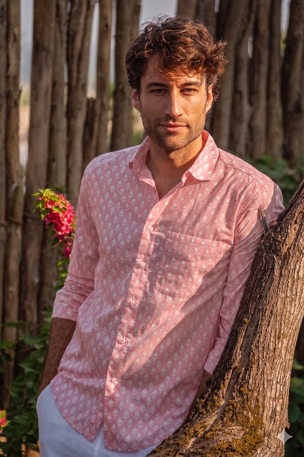 Man wearing a pink patterned shirt