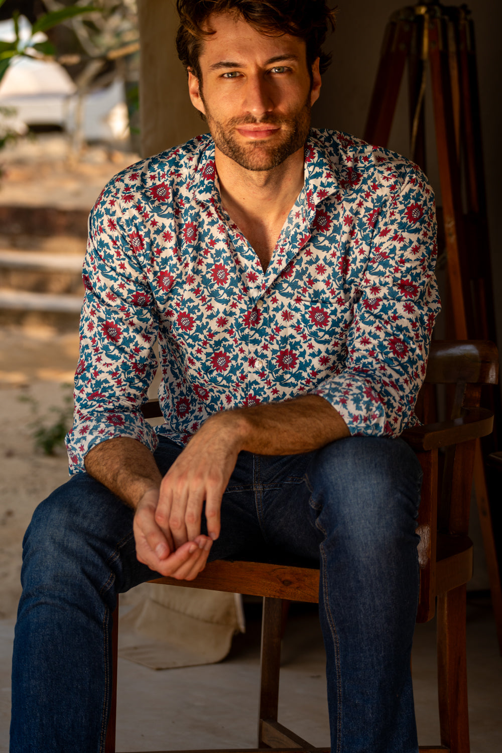 Man wearing a colorful floral shirt